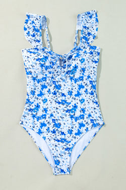 Cingcio blu floreale con lana in cima a cavo out un costume da bagno con un pezzo