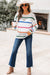 Maglione a maglia a strisce a strisce di colore bianco