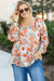 Blusa de peplum de cuello cuadrado de estampado de flores de talla grande de talla grande