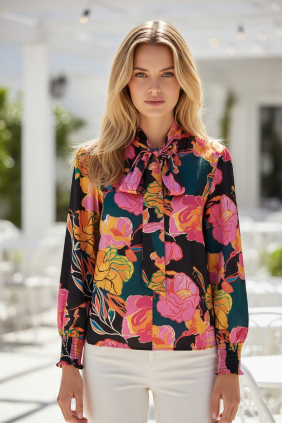 Camicetta con scollo a V e maniche a sbuffo con polsini smock con stampa floreale nera