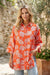 Mini vestido de camisa solta com estampa floral preta de estampa floral