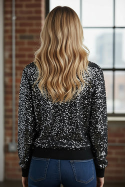 Camicetta a maniche lunghe con paillettes nera