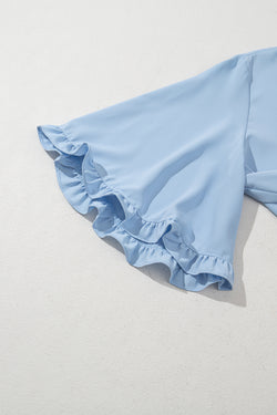 Myosotis Frilly rotonde a mezza camicetta a mezza manica