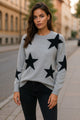 Maglione di spalla grigia a stella