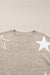 Maglione di spalla grigia a stella