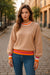 Maglione a goccia a strisce colorblock a strisce di pergamena