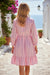 Camisa de cuello con botones de dobladillo rosa rubor
