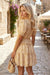 Mini robe à manches courtes à manches courtes à floral jaune
