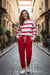 Pullover della spalla a goccia rossa e pantaloni da jogger