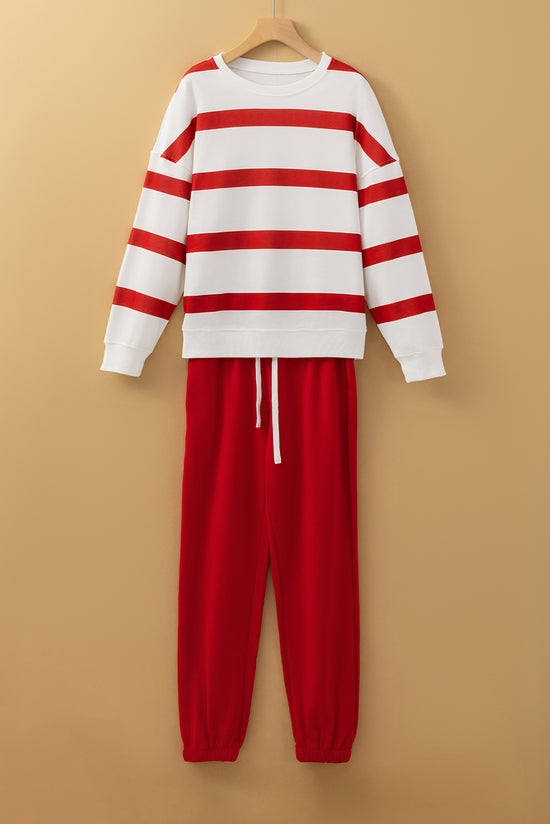 Pullover della spalla a goccia rossa e pantaloni da jogger