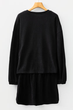 Conjunto de pantalones cortos con cordón y jersey de hombros caídos de punto con textura de color sólido negro