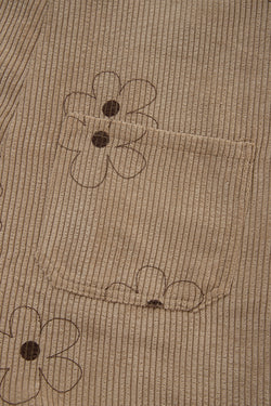 Mutura de la pana de estampado de flores caqui