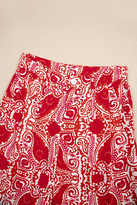 Pantaloni gambe a vita alta stampati con stampato rosso paisley