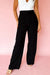 Pantalon droit ample à taille haute élastique rouge vif avec détails plissés