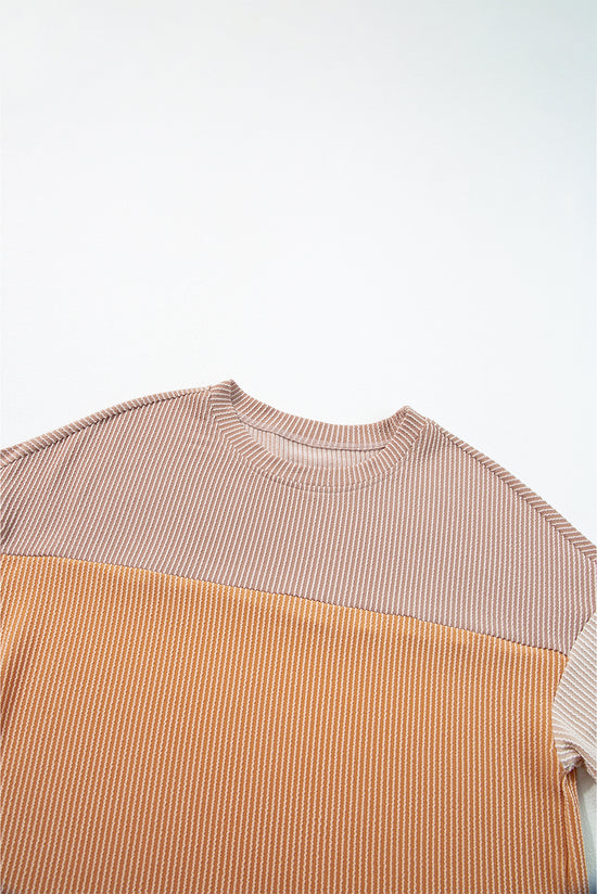 Flitte laterali a costine a costine di colore rosa Top a mezza manica