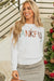 Maglione ricamato in avorio bianco