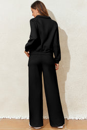 Sudadera con cuello sólido negro y pantalones de cintura alta