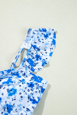 Cingcio blu floreale con lana in cima a cavo out un costume da bagno con un pezzo