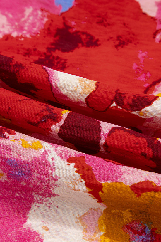 Camicetta a manica corta con rotama a vcalia azziata rossa