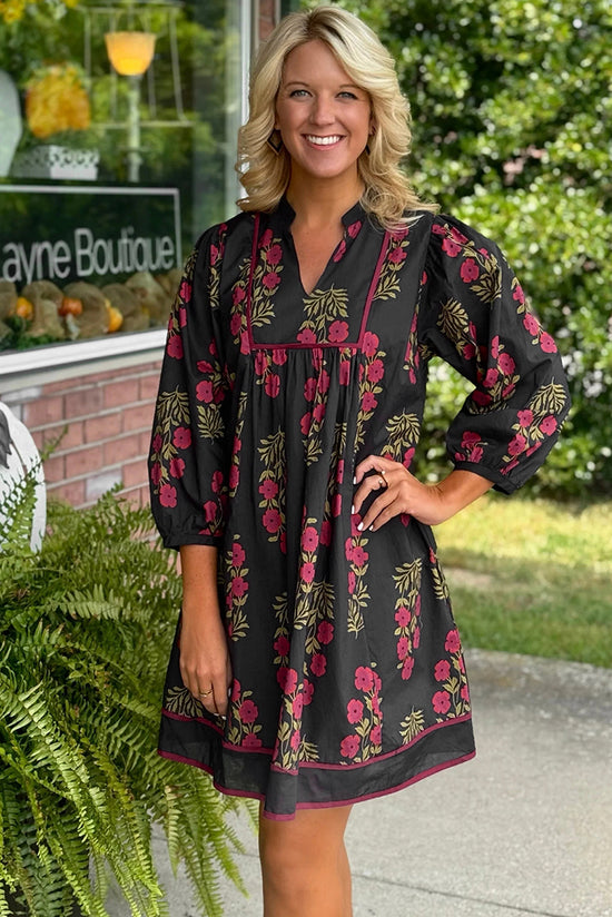 Robe babydoll noire à imprimé floral et col cranté avec bordure passepoilée et manches bracelet