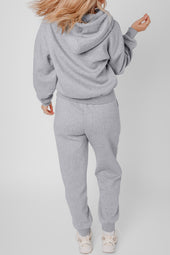 Casas sólidas grises expuestas sudaderas y corredores activos set de ropa activa