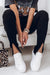 Leggings con spacco a vita alta in maglia a coste nere