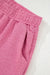 Taglie e pantaloncini a Viatura a Vagiatura arancione e pantaloncini