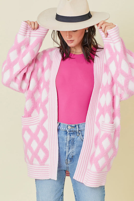 Modèle de rhombus rose tricoté des cardigans à poche avant
