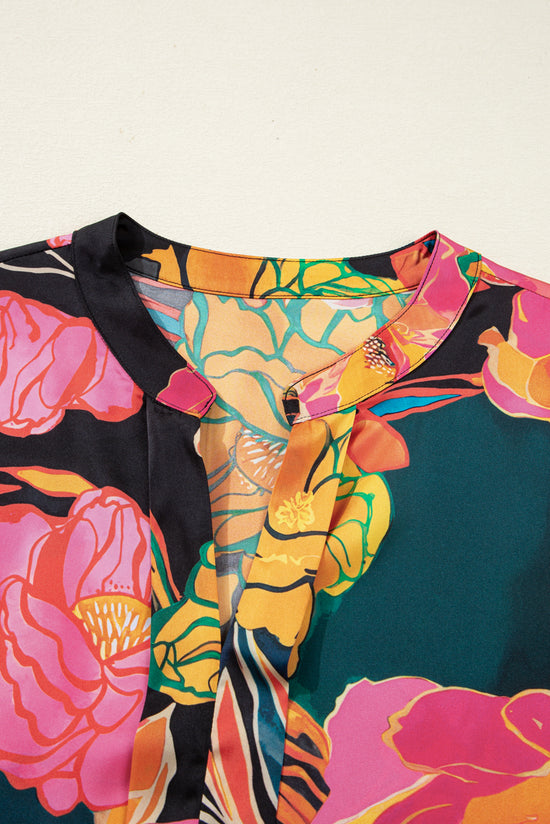 Camicetta con scollo a V e maniche a sbuffo con polsini smock con stampa floreale nera