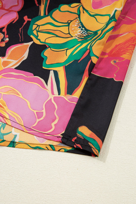 Camicetta con scollo a V e maniche a sbuffo con polsini smock con stampa floreale nera