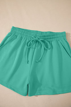 Meadow Mist Green Solid Sole Lo suelto V Neck Media manga y pantalones pantalones cortos
