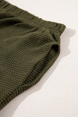 Champe boutonnée texturée de couleur unie noire et pantalon décontracté