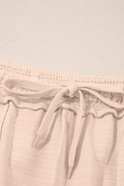 Camisa y pantalones cortos con cuello con textura de color naranja