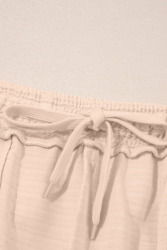 Taglie e pantaloncini a Viatura a Vagiatura arancione e pantaloncini