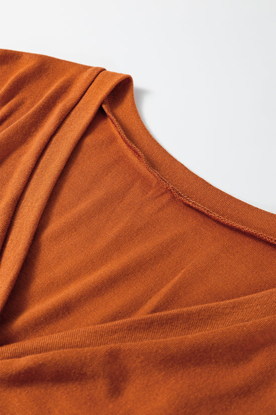 Coux de contraste orange de pamplemousse sur le cou à manche en V bouton