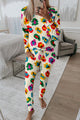 Top a manicotto lungo a manicotto leopardo di albicocche e pantaloni magri
