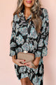Mini vestido de camisa solta com estampa floral preta de estampa floral