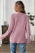 Haut en tricot Henley rose à épaules tombantes et texture côtelée