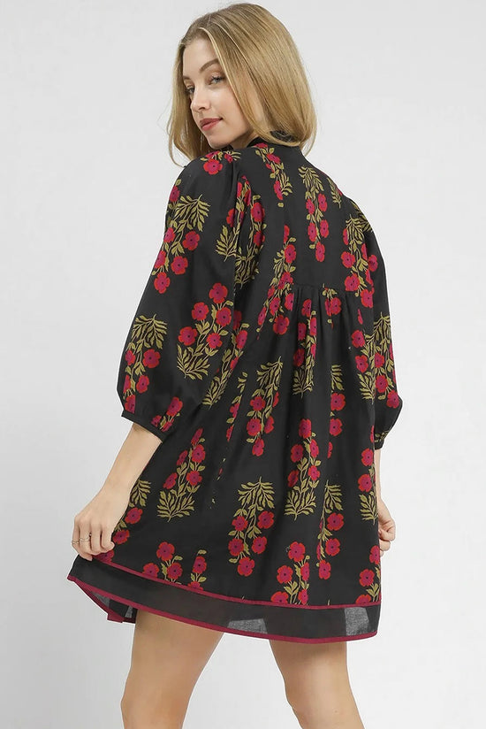 Robe babydoll noire à imprimé floral et col cranté avec bordure passepoilée et manches bracelet