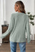Haut en tricot Henley rose à épaules tombantes et texture côtelée