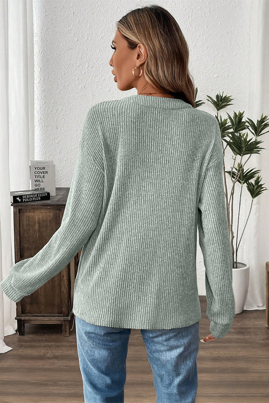 Haut en tricot Henley rose à épaules tombantes et texture côtelée